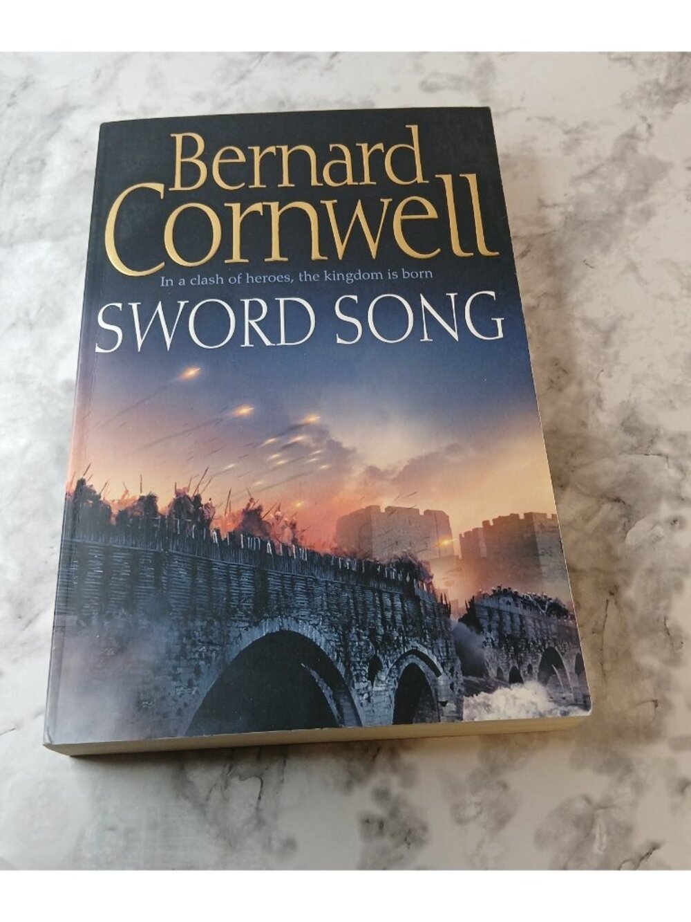 Sword Song by Bernard Cornwell Paperback – Saxon Stories Historical Fiction